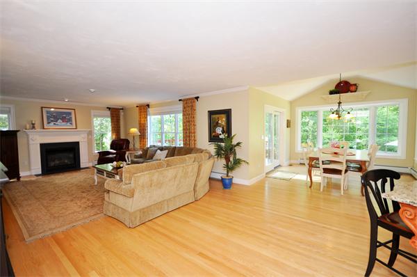 71 Chamberlain Road Westford, MA 01886 - Photo 5 of 30 a living room with furniture and a fireplace