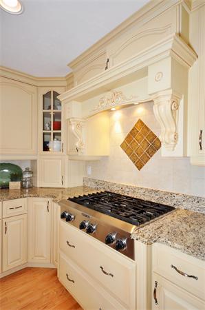 71 Chamberlain Road Westford, MA 01886 - Photo 10 of 30 a kitchen with granite countertop a stove and a sink