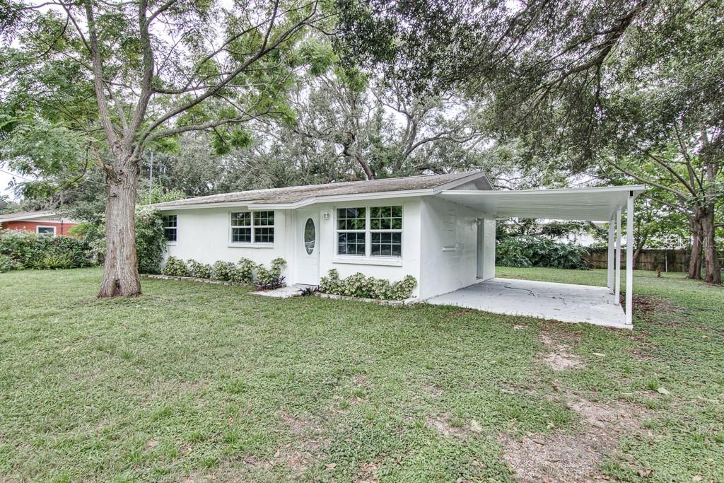 front view of a house with a yard
