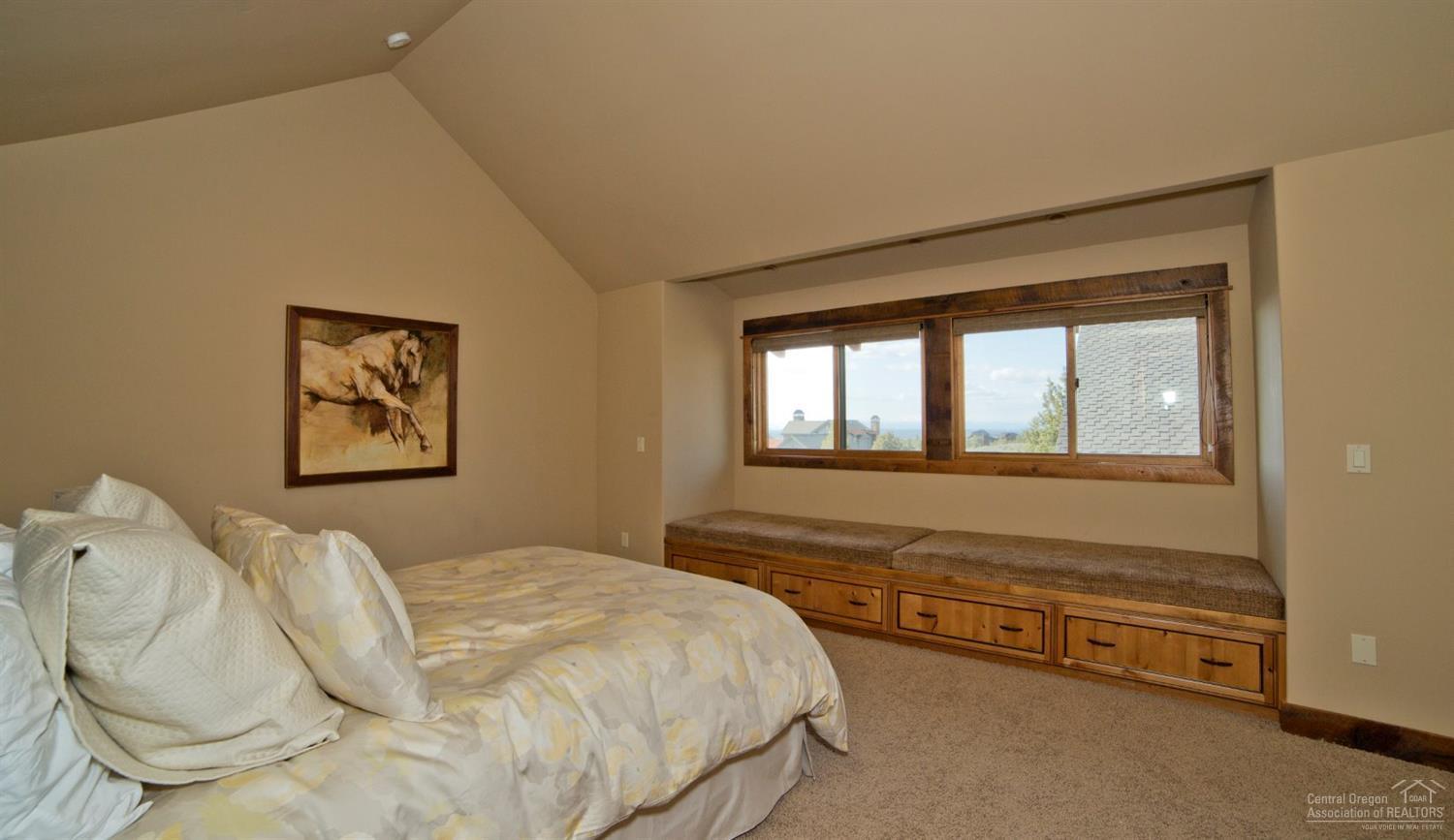 16448 South W Brasada Ranch Road Powell Butte, OR 97753 - Photo 15 of 25 a bedroom with a bed and a window