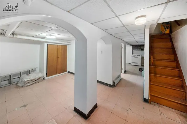 a view of a hallway to the room