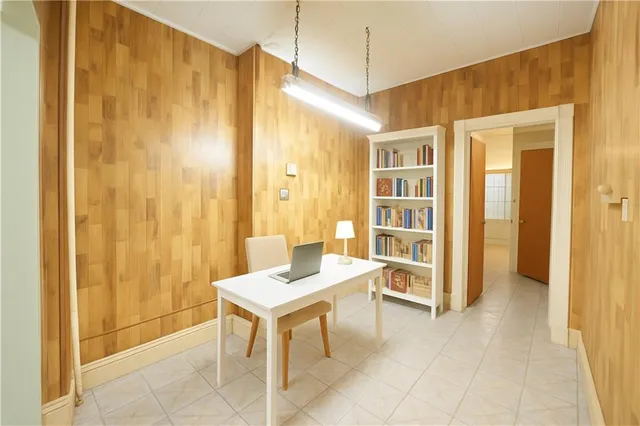 a spacious bathroom with a tub and shower
