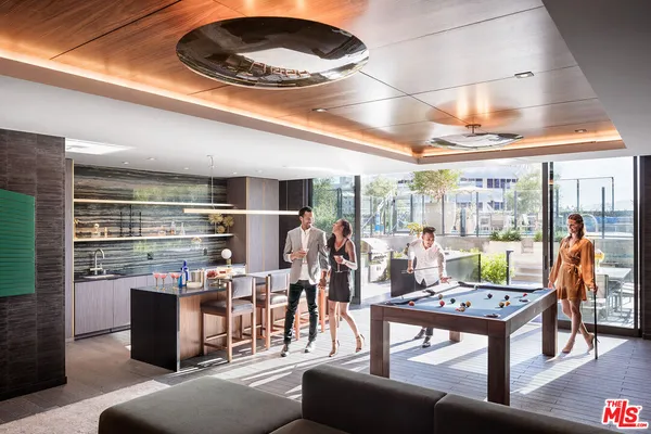 a living room with furniture a flat screen tv and a large window