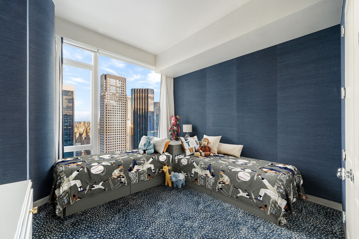 20 West 53rd Street, Unit 38A Manhattan, NY 10019 - Photo 14 of 20 a bedroom with bed and a window