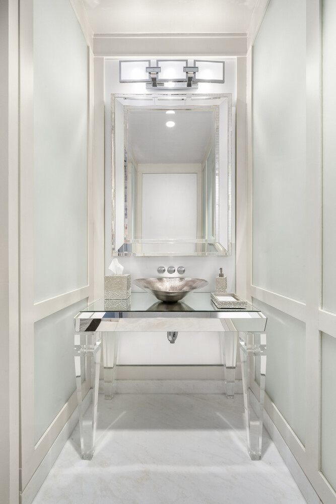 20 West 53rd Street, Unit 38A Manhattan, NY 10019 - Photo 8 of 20 a bathroom with a sink vanity and a mirror