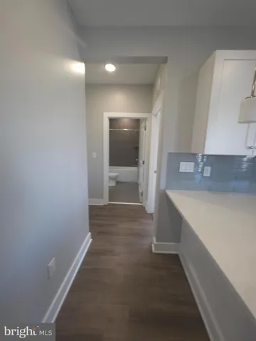 a bathroom with a sink and a shower