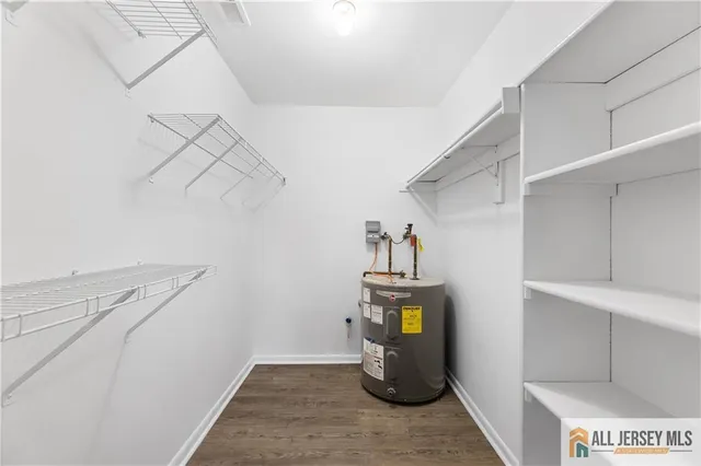 a view of storage and utility room with washer and dryer