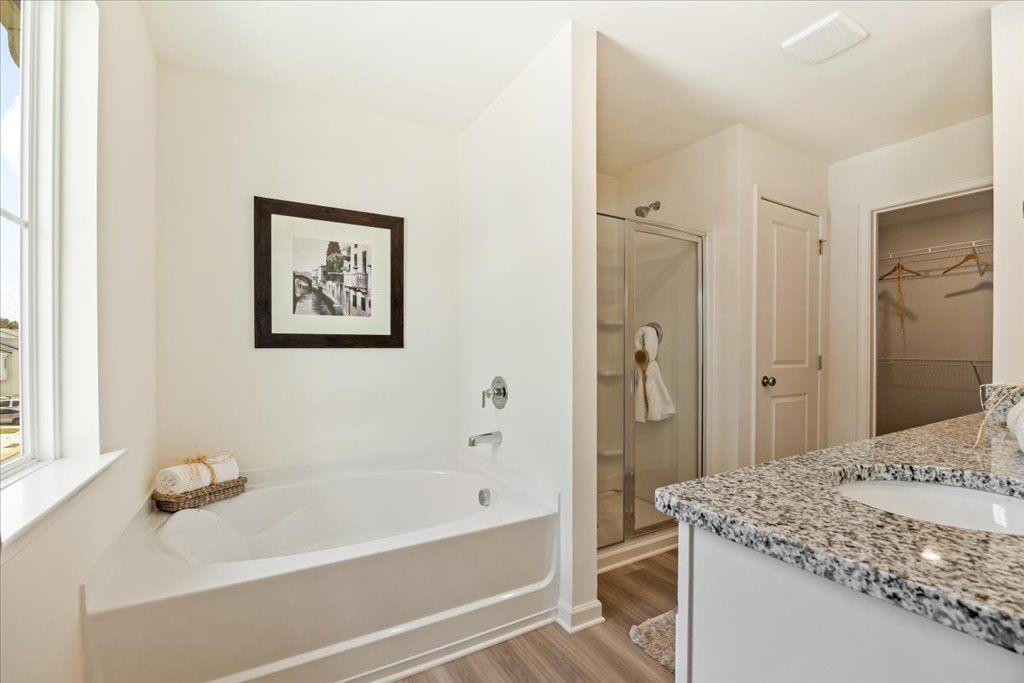 2526 Riverside Court Northeast Conyers, GA 30013 - Photo 14 of 22 a bathroom with a granite countertop sink
