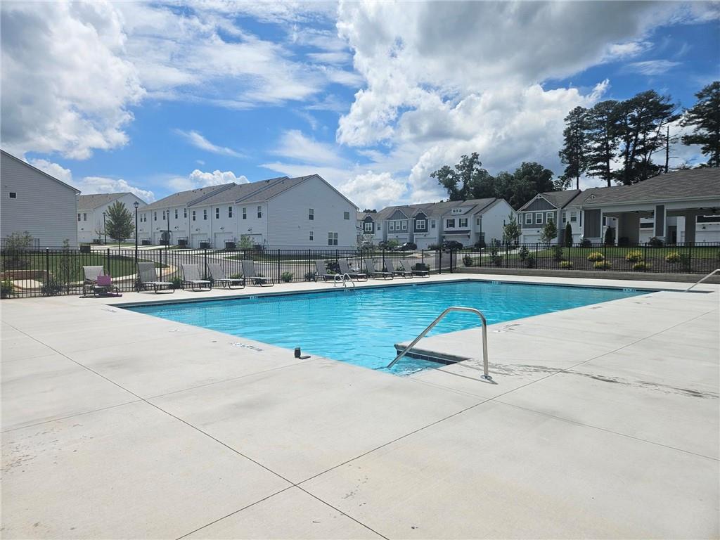2526 Riverside Court Northeast Conyers, GA 30013 - Photo 21 of 22 a view of a lake with a house