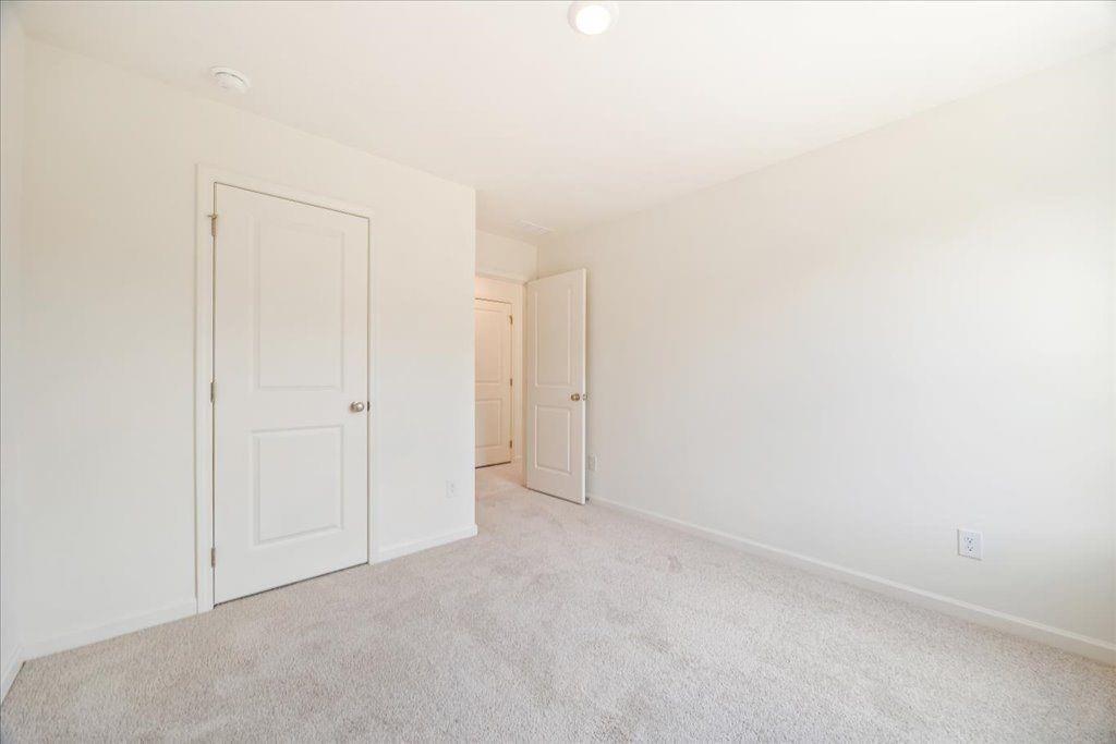 2526 Riverside Court Northeast Conyers, GA 30013 - Photo 9 of 22 a view of an empty room