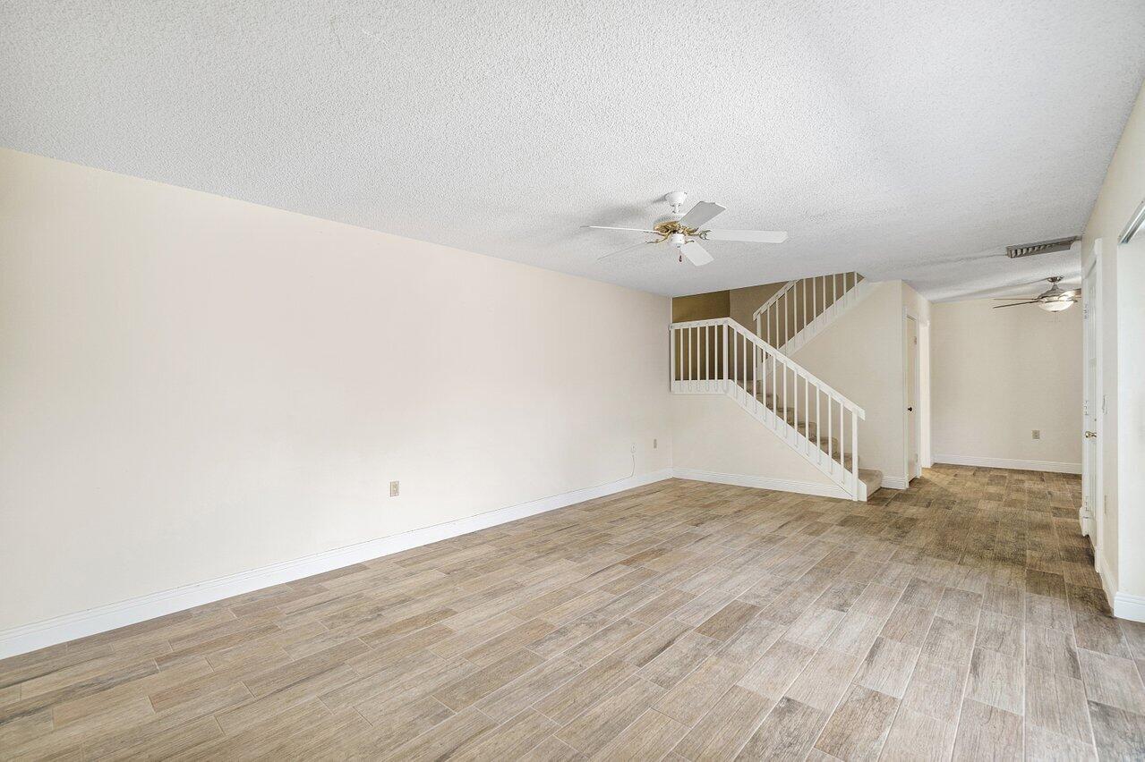 1619 16th Court Jupiter, FL 33477 - Photo 14 of 31 a view of a room with wooden floor