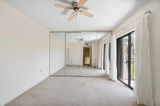 a view of a glass door with a porch