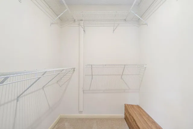 a bathroom with a sink a toilet and vanity