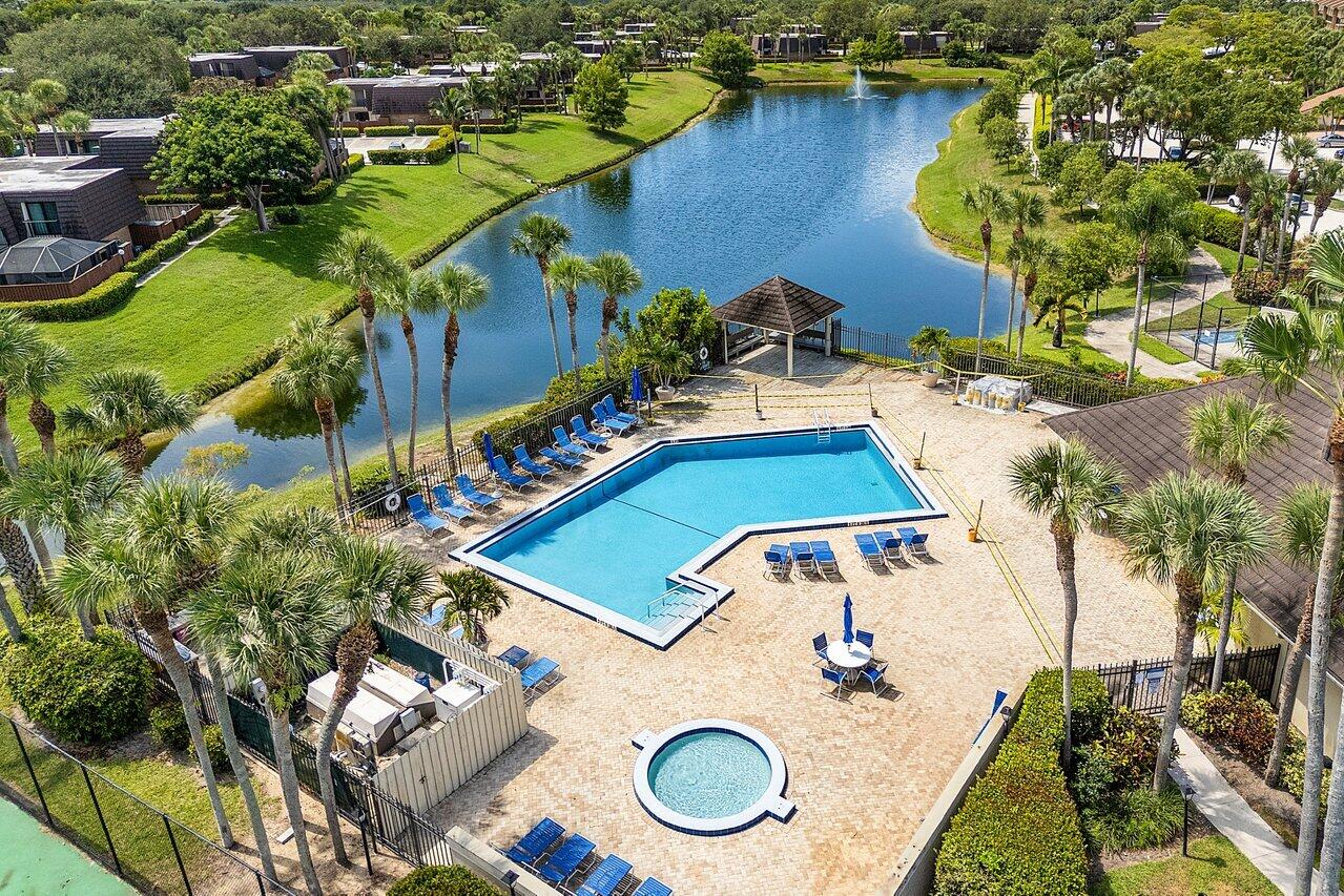 1619 16th Court Jupiter, FL 33477 - Photo 30 of 31 an aerial view of house with yard swimming pool and outdoor seating