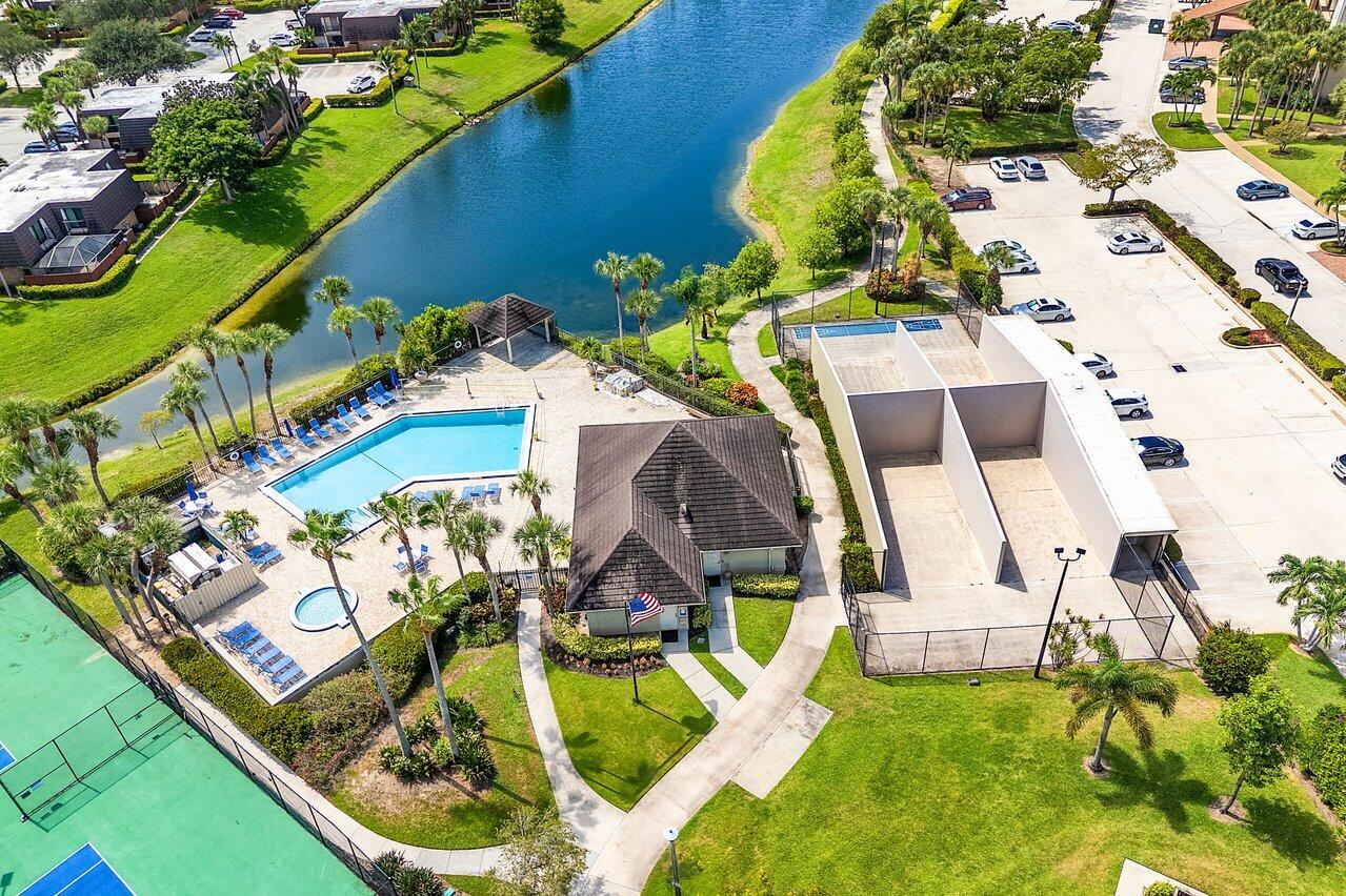 1619 16th Court Jupiter, FL 33477 - Photo 31 of 31 an aerial view of residential house with outdoor space and swimming pool