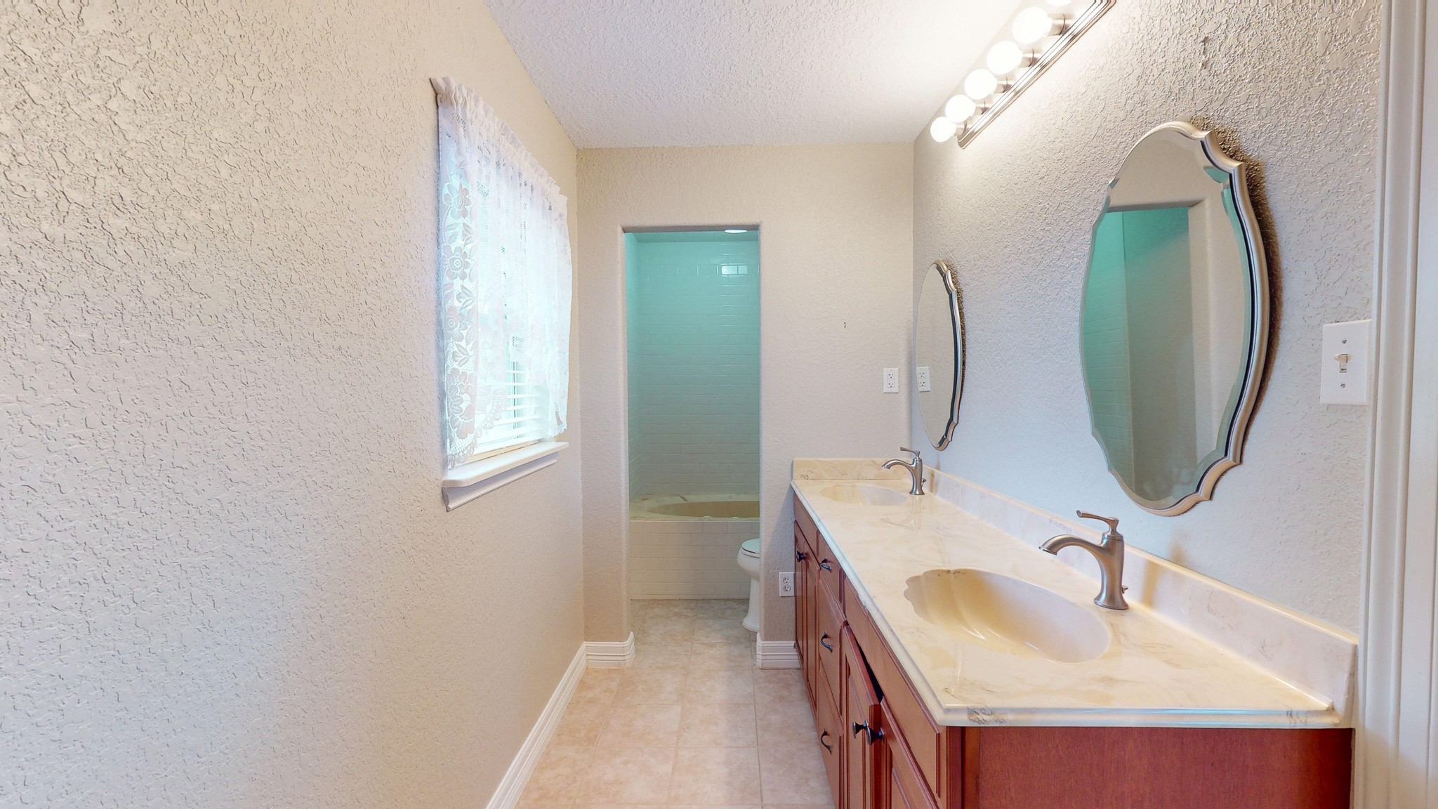 4770 County Road 31 Angleton, TX 77515 - Photo 17 of 44 Double vanity in primary bathroom