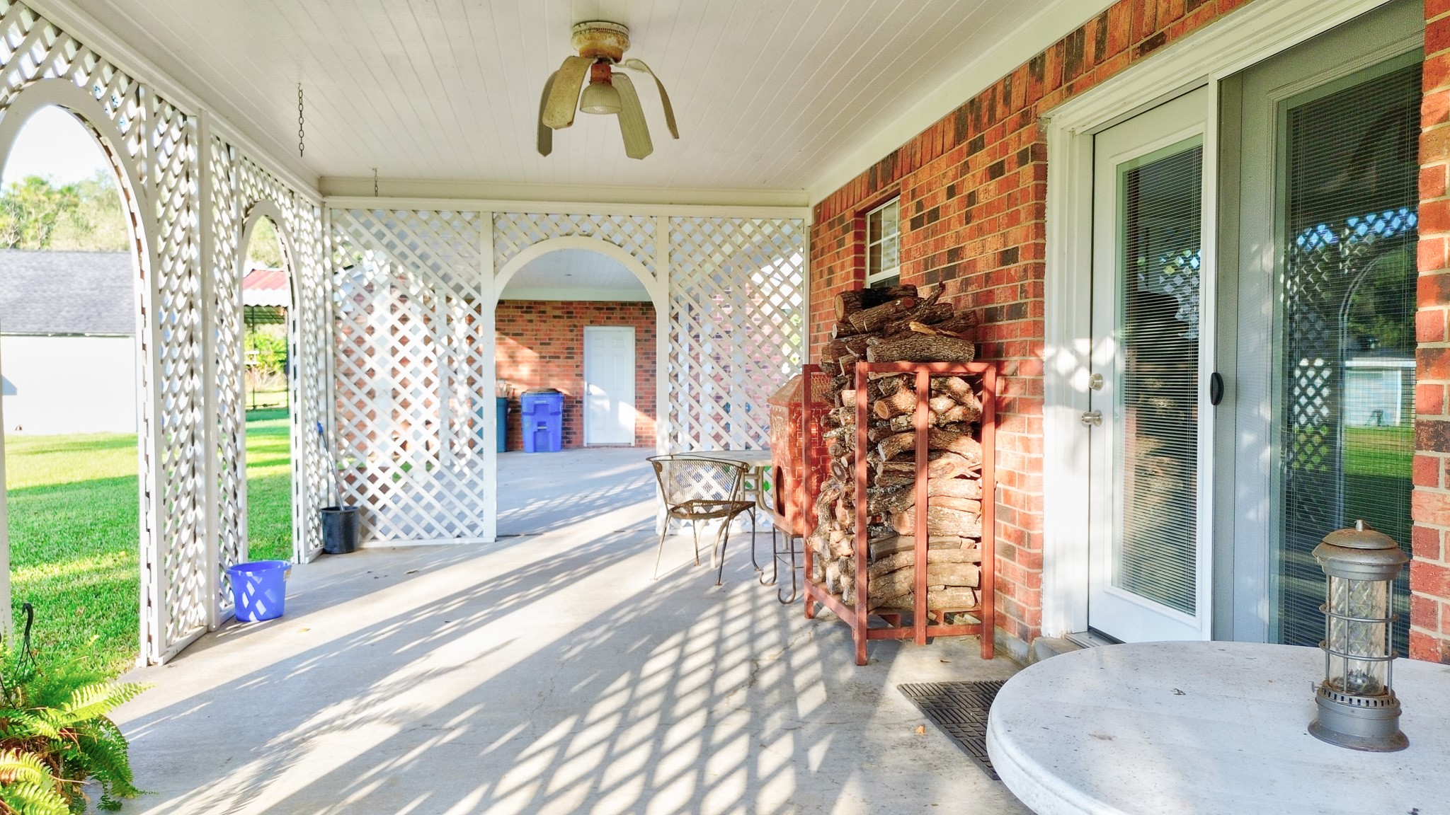 4770 County Road 31 Angleton, TX 77515 - Photo 34 of 44 Covered patio space with beautiful archways framing the acreage