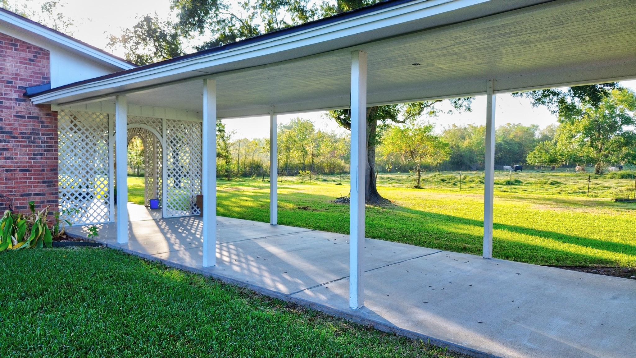 4770 County Road 31 Angleton, TX 77515 - Photo 36 of 44 Covered walk from house to garage