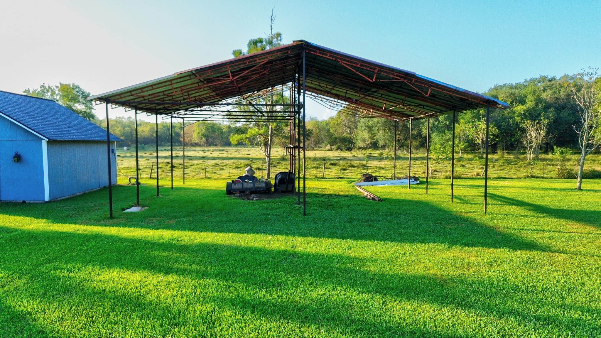 4770 County Road 31 Angleton, TX 77515 - Photo 42 of 44 Lean to for covered storage of equipment
