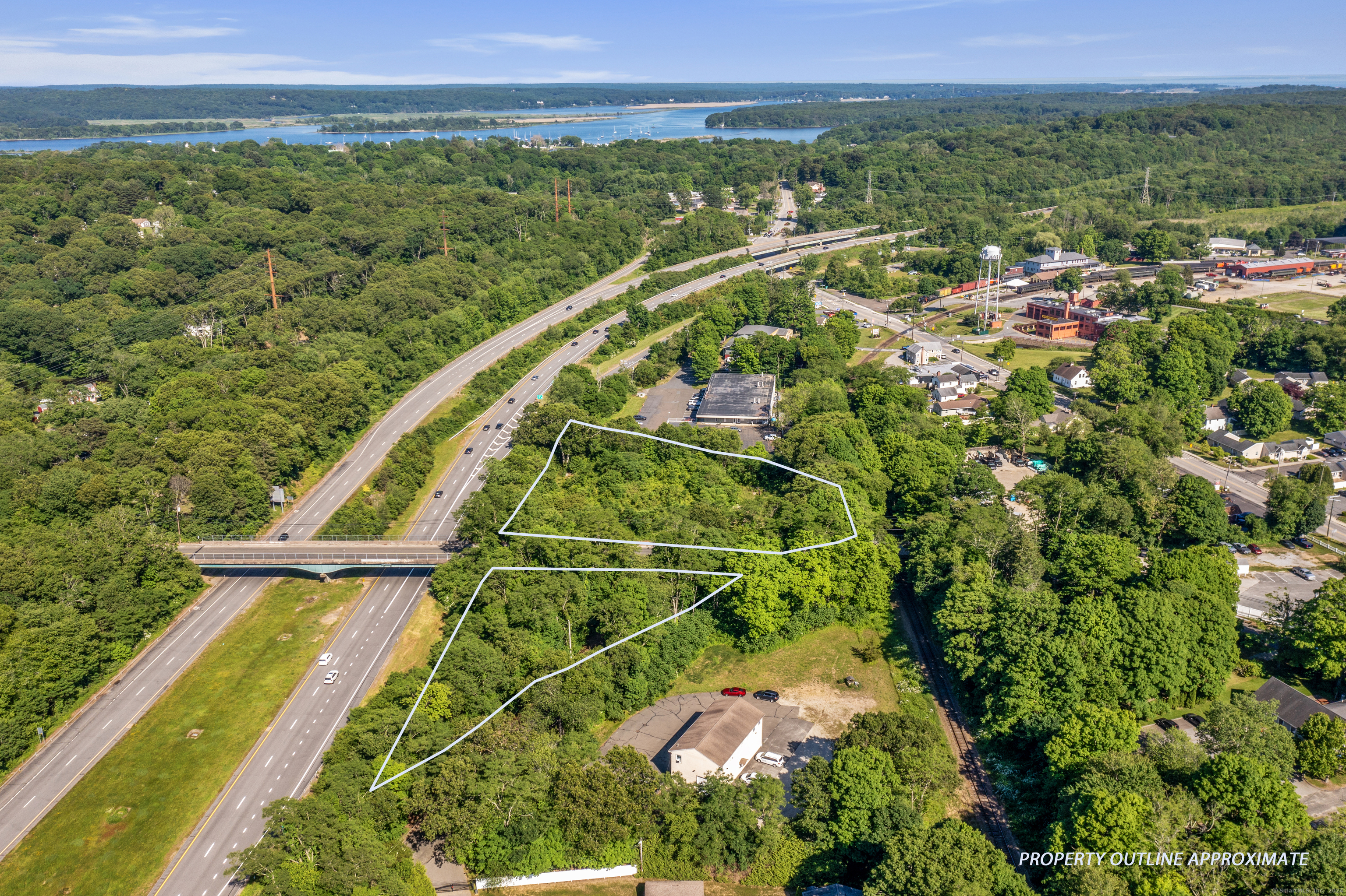 130 Dennison Road Essex, CT 06426 - Photo 2 of 9 a view of a city from a balcony