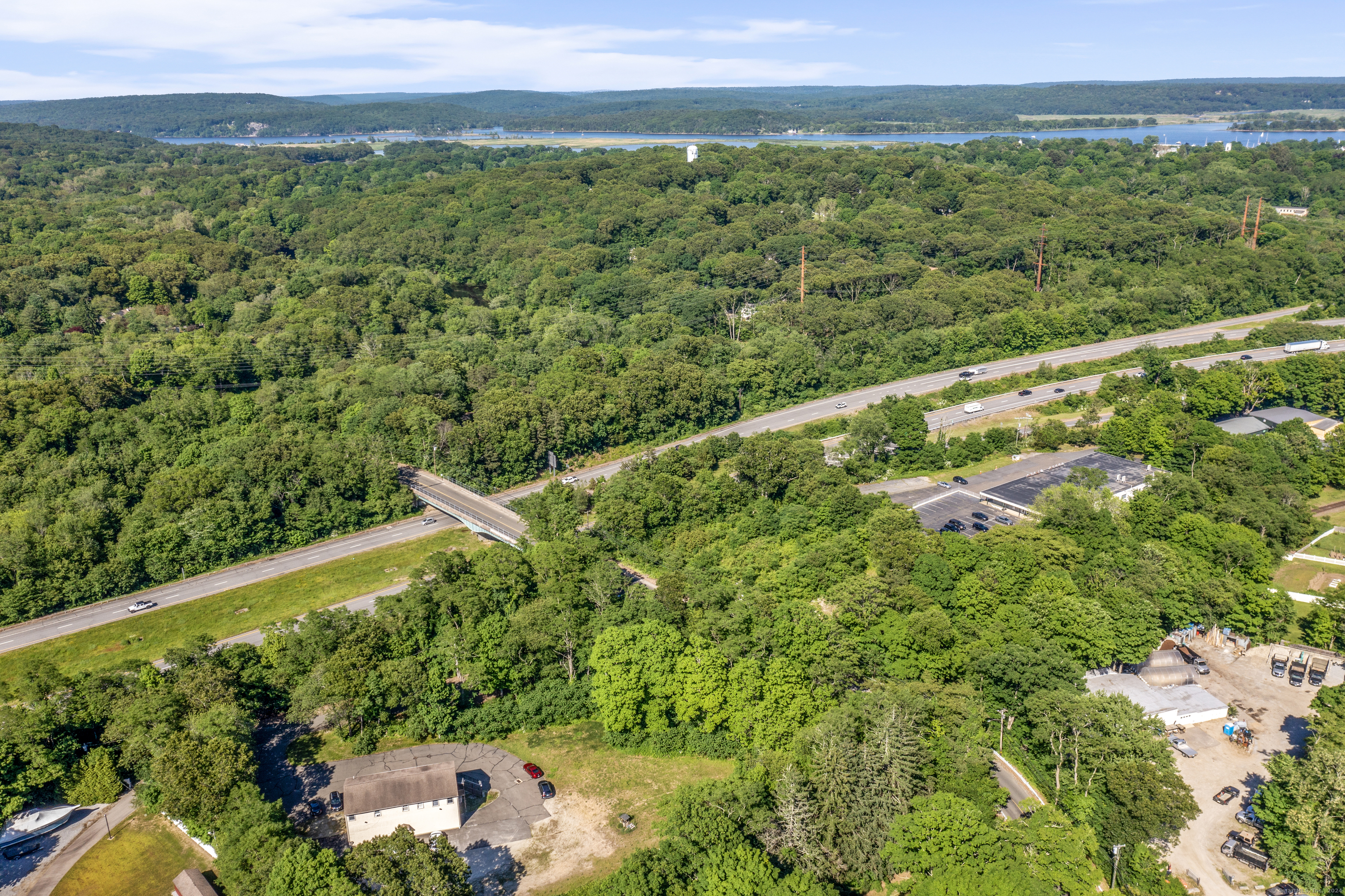 130 Dennison Road Essex, CT 06426 - Photo 5 of 9 a view of a lush green field