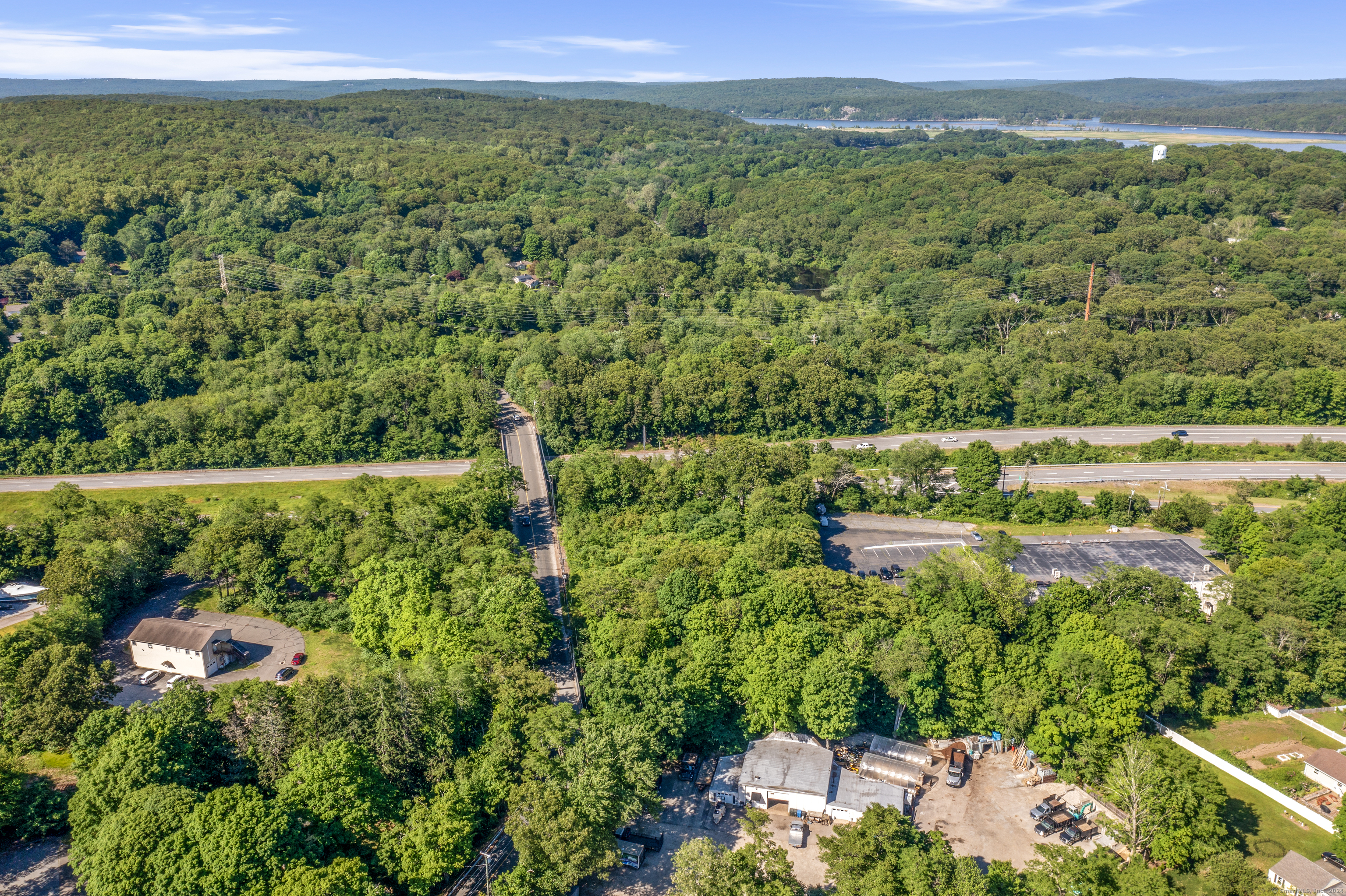 130 Dennison Road Essex, CT 06426 - Photo 6 of 9 a view of a lake with a mountain in the background