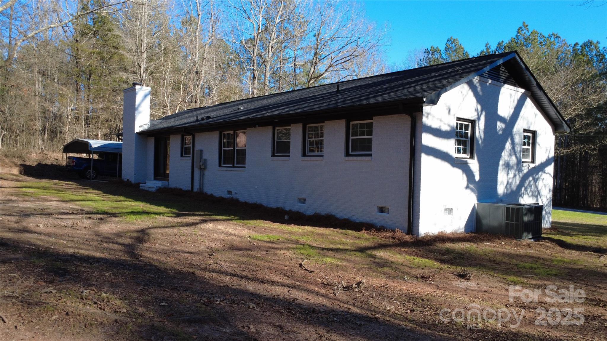 6726 Lockhart Road Sharon, SC 29742 - Photo 19 of 23 a view of a house with a yard