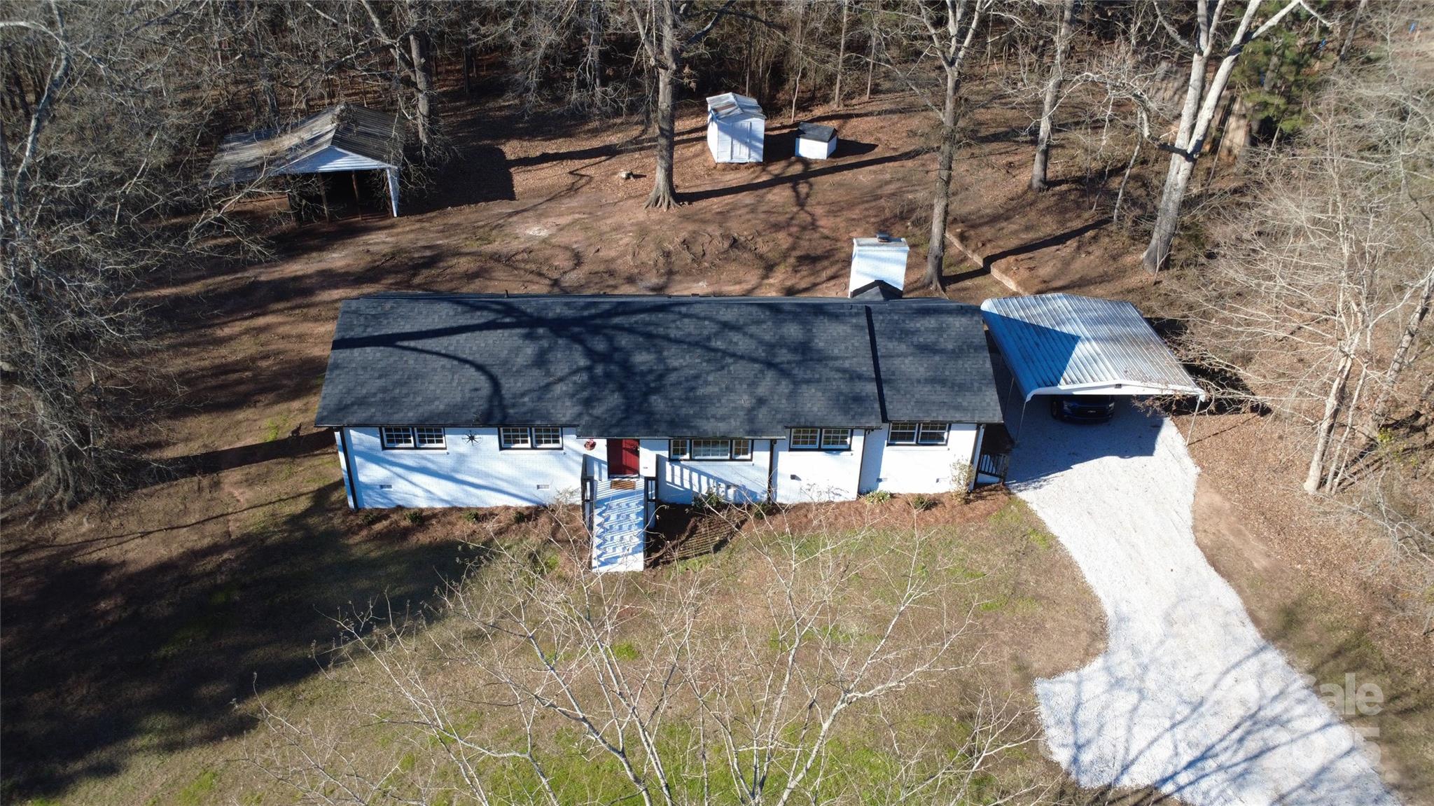 6726 Lockhart Road Sharon, SC 29742 - Photo 6 of 23 a view of a house with a snow