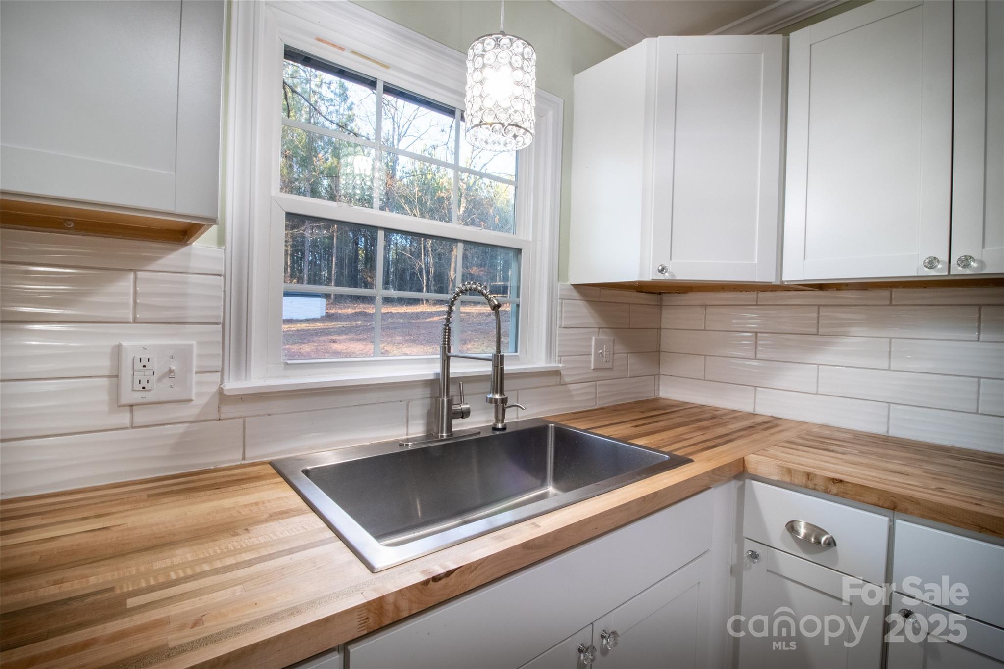 6726 Lockhart Road Sharon, SC 29742 - Photo 10 of 23 a kitchen with a sink and large window