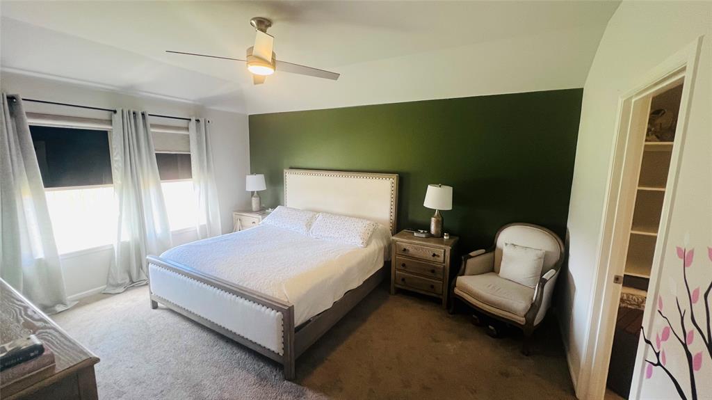 16729 Milwaukee Street Justin, TX 76247 - Photo 17 of 23 a bedroom with a bed and a window