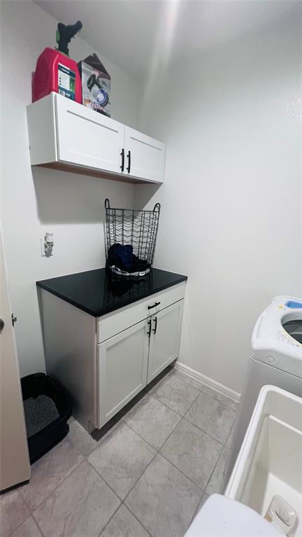 16729 Milwaukee Street Justin, TX 76247 - Photo 21 of 23 a utility room with dryer and washer