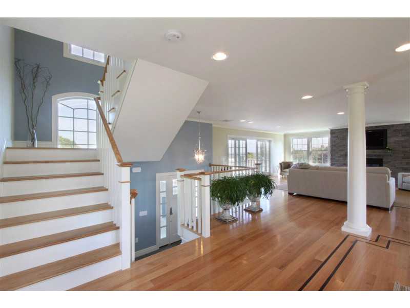 426 Tuckerman Avenue Middletown, RI 02842 - Photo 10 of 32 Entry. Grand entry from front door with inlaid solid wood floors and lots of windows.