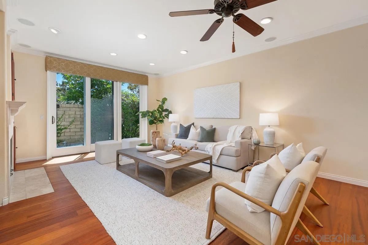 1329 Caminito Balada La Jolla, CA 92037 - Photo 11 of 31 a living room with furniture and a large window