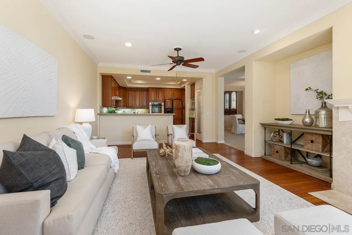 1329 Caminito Balada La Jolla, CA 92037 - Photo 12 of 31 a living room with furniture kitchen view and a chandelier