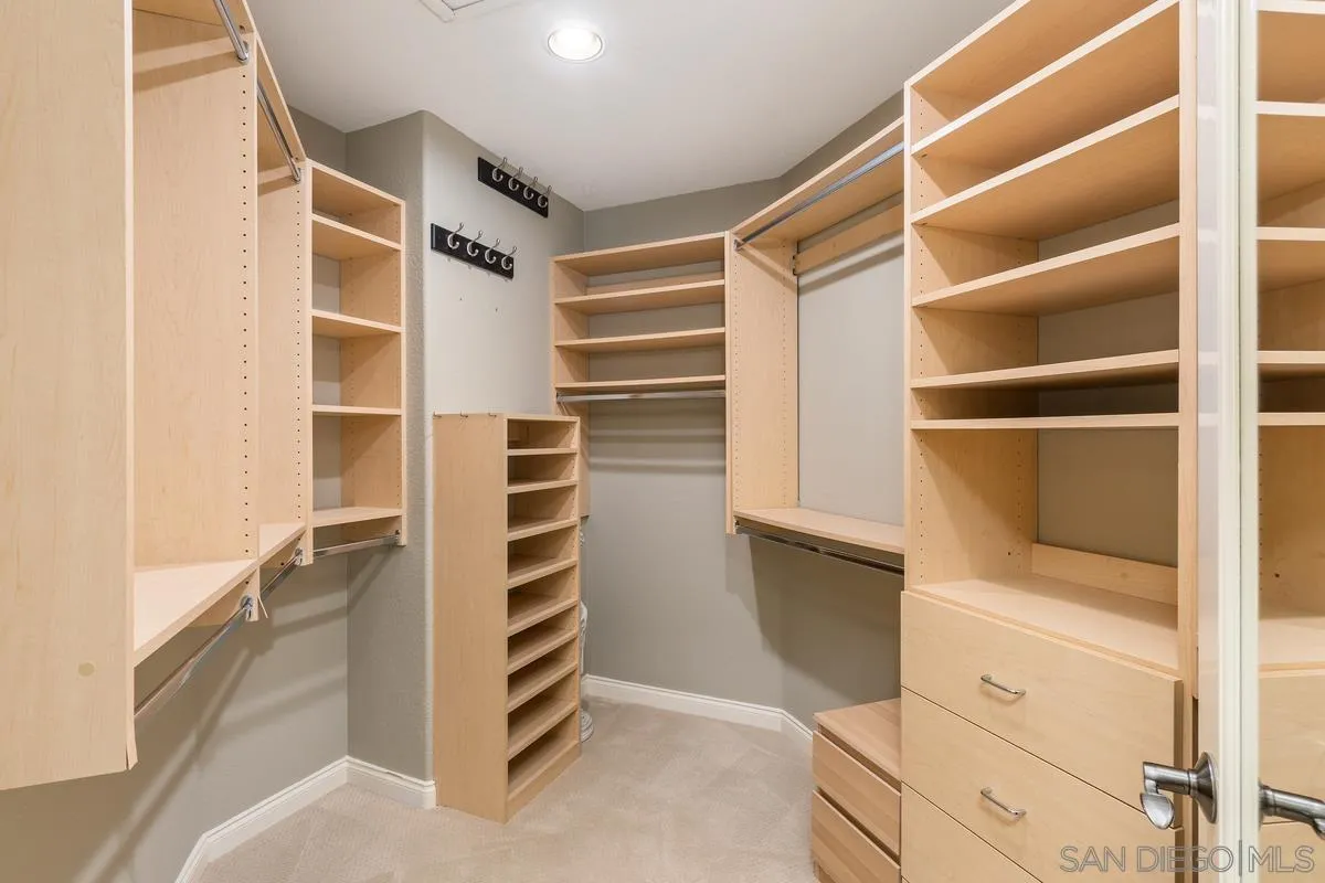 1329 Caminito Balada La Jolla, CA 92037 - Photo 20 of 31 a view of walk in closet with empty racks