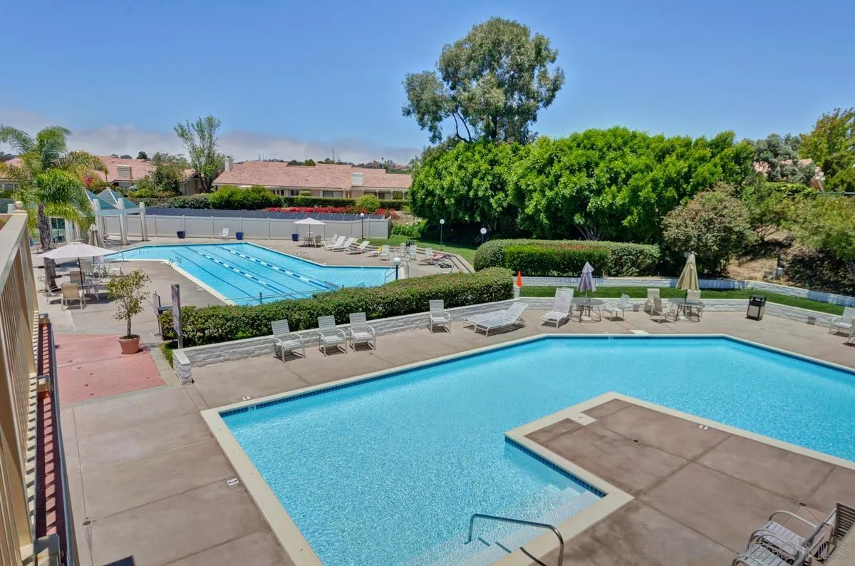 1329 Caminito Balada La Jolla, CA 92037 - Photo 30 of 31 a view of a swimming pool and lounge chair
