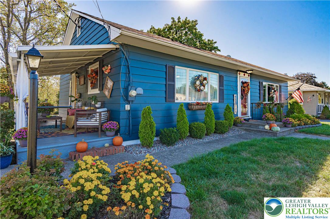 544 School Road Nazareth, PA 18064 - Photo 1 of 35 a front view of a house with garden
