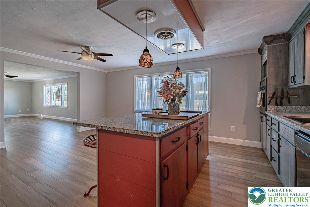 544 School Road Nazareth, PA 18064 - Photo 15 of 35 a kitchen with granite countertop a stove and a sink