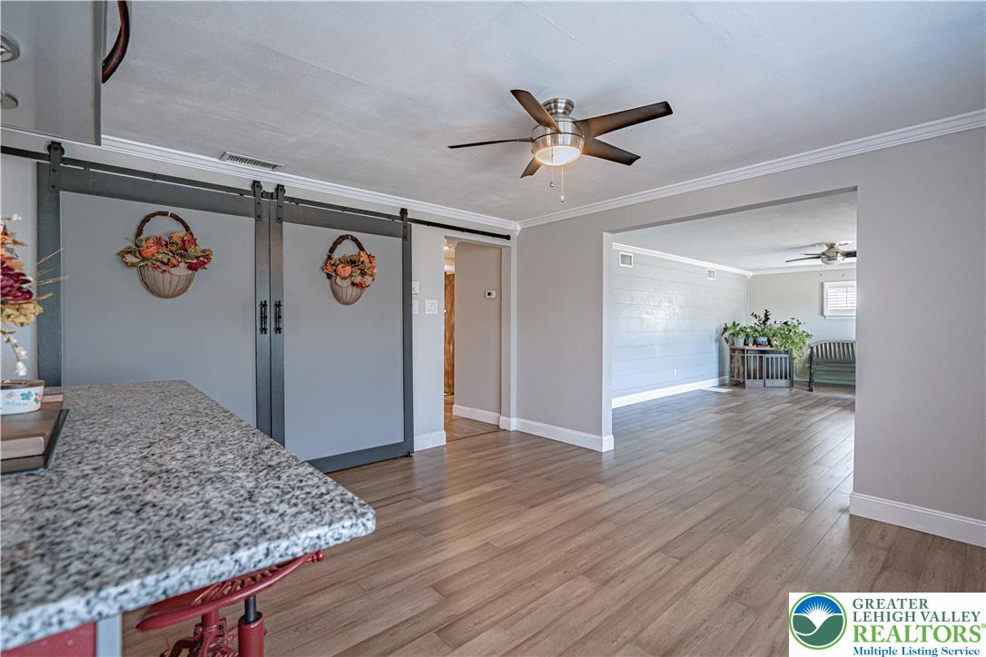544 School Road Nazareth, PA 18064 - Photo 16 of 35 a view of a hallway with wooden floor