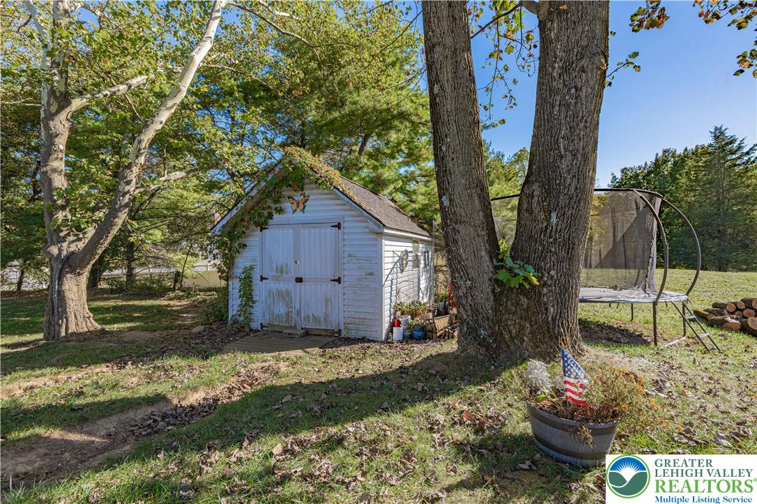 544 School Road Nazareth, PA 18064 - Photo 35 of 35 a backyard of a house with lots of green space