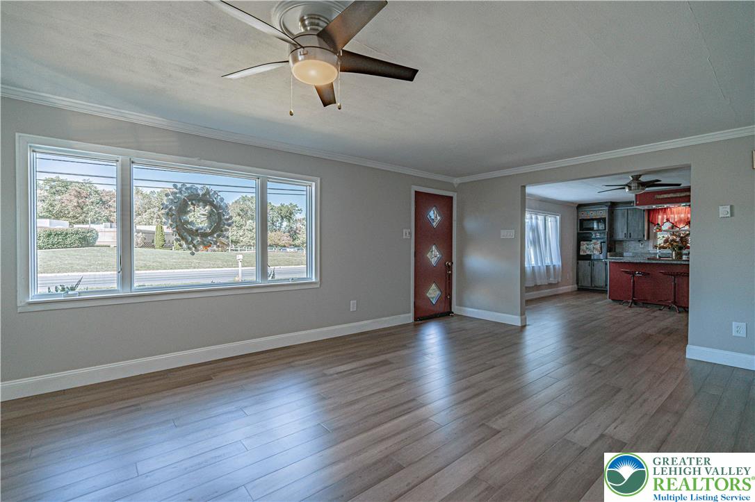 544 School Road Nazareth, PA 18064 - Photo 9 of 35 a view of an empty room with window and wooden floor