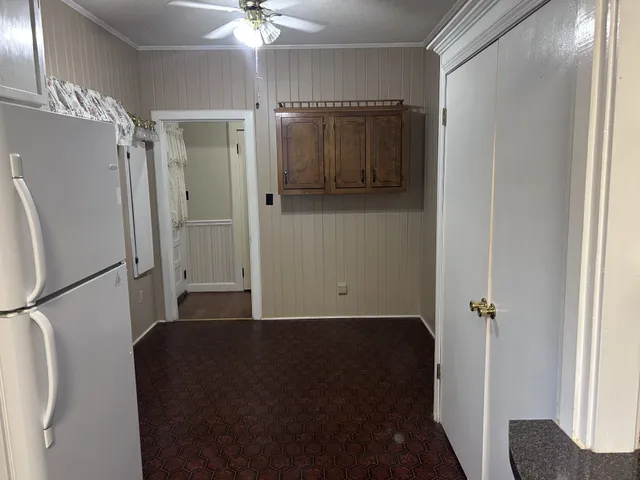 a kitchen that has a sink and a stove