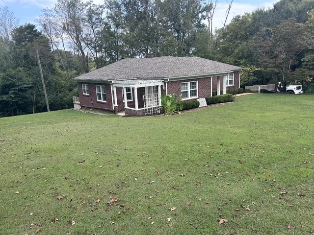 a aerial view of a house with garden