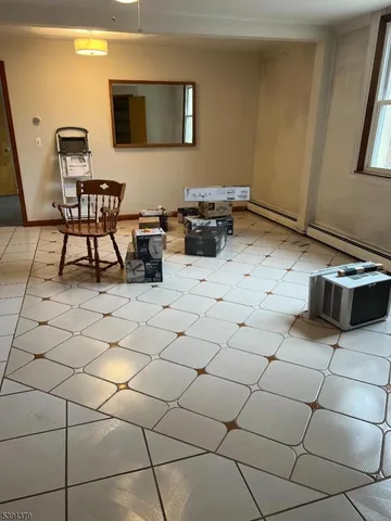 a kitchen with a sink and a stove top oven