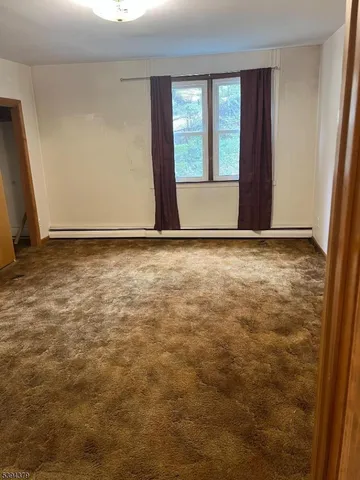 a view of an empty room with window