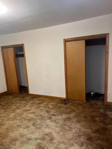 an empty room with closet