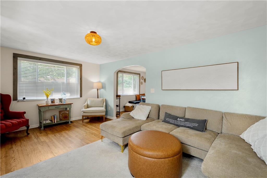 200 Fox Chapel Road Pittsburgh, PA 15238 - Photo 7 of 32 a living room with furniture and a table