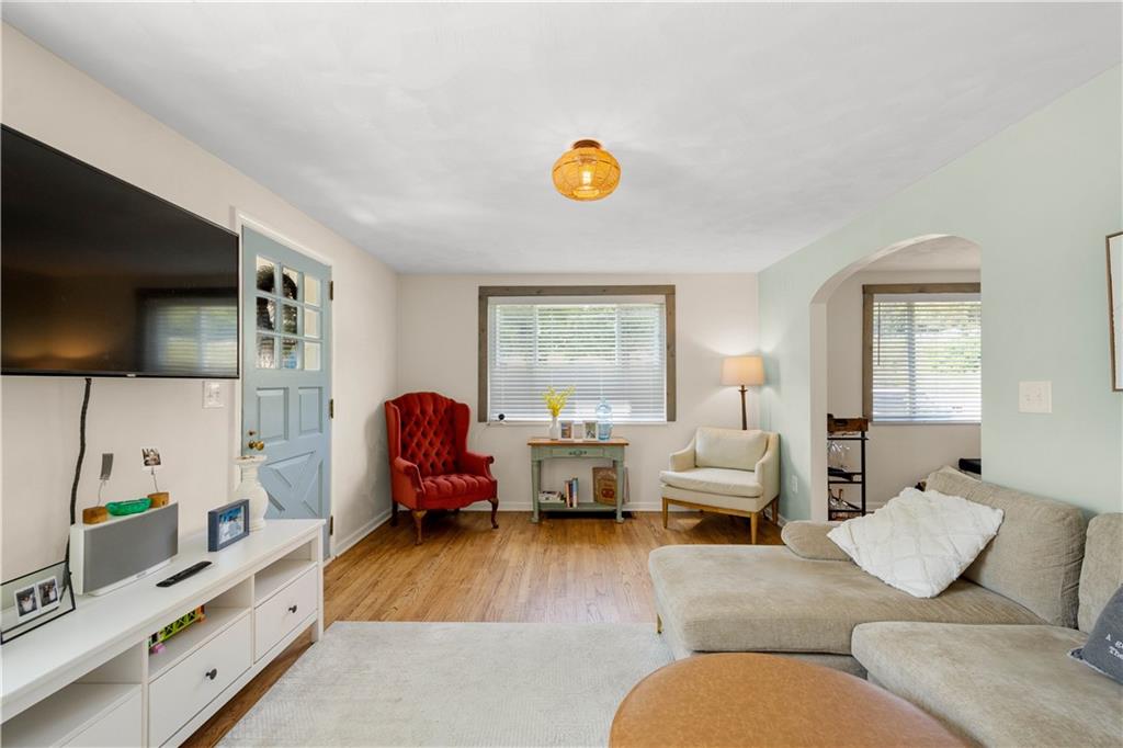 200 Fox Chapel Road Pittsburgh, PA 15238 - Photo 8 of 32 a living room with furniture fireplace and flat screen tv