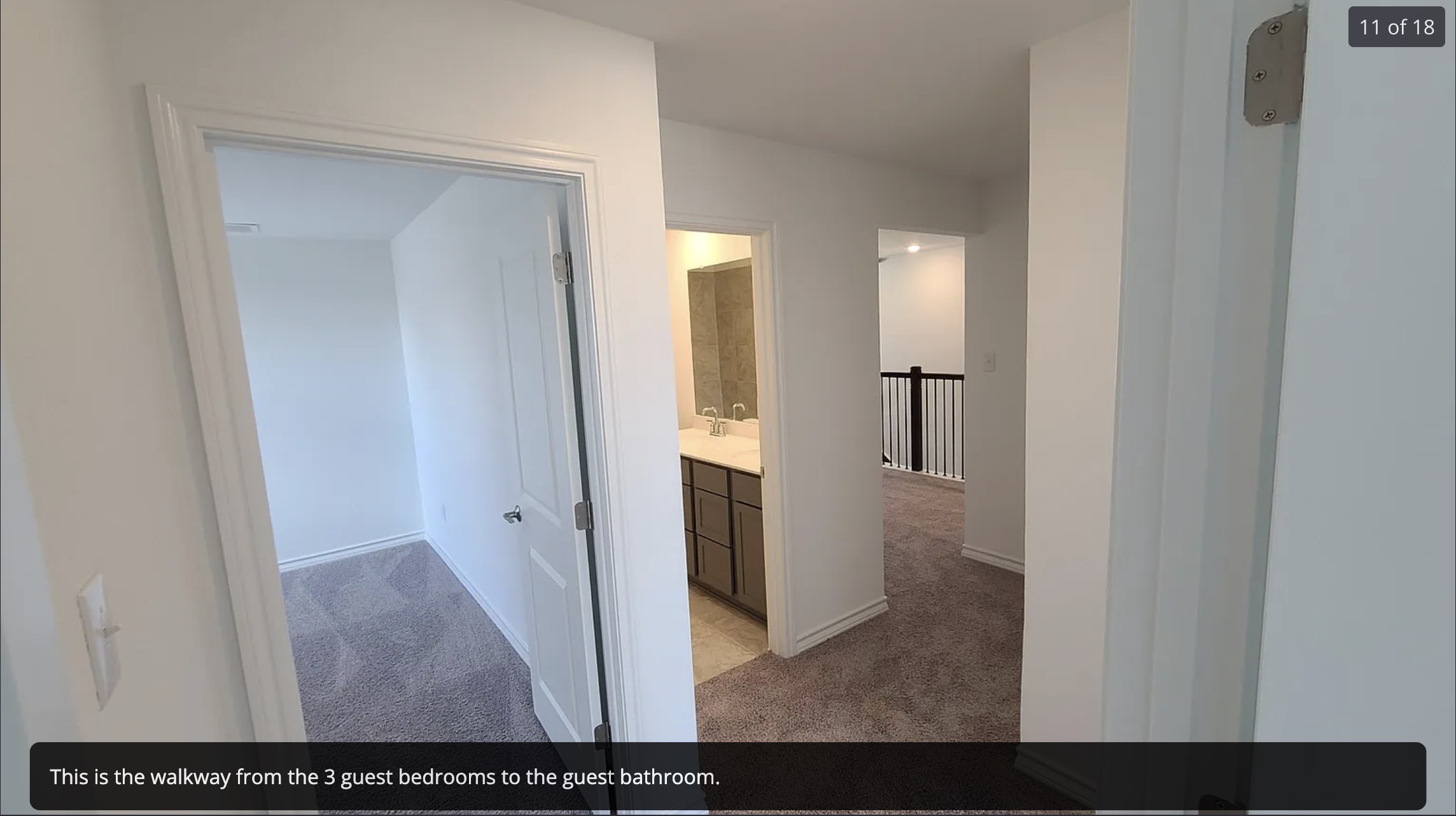 561 Pepperbark Loop Buda, TX 78610 - Photo 12 of 15 Hallway featuring light colored carpet and baseboards