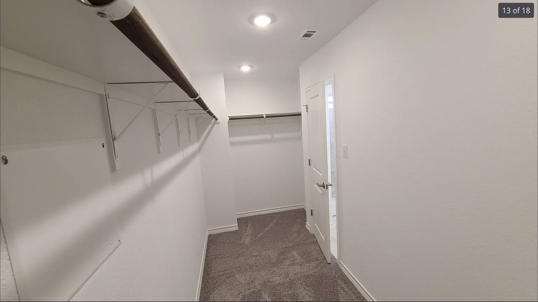 561 Pepperbark Loop Buda, TX 78610 - Photo 15 of 15 Walk in closet featuring dark colored carpet